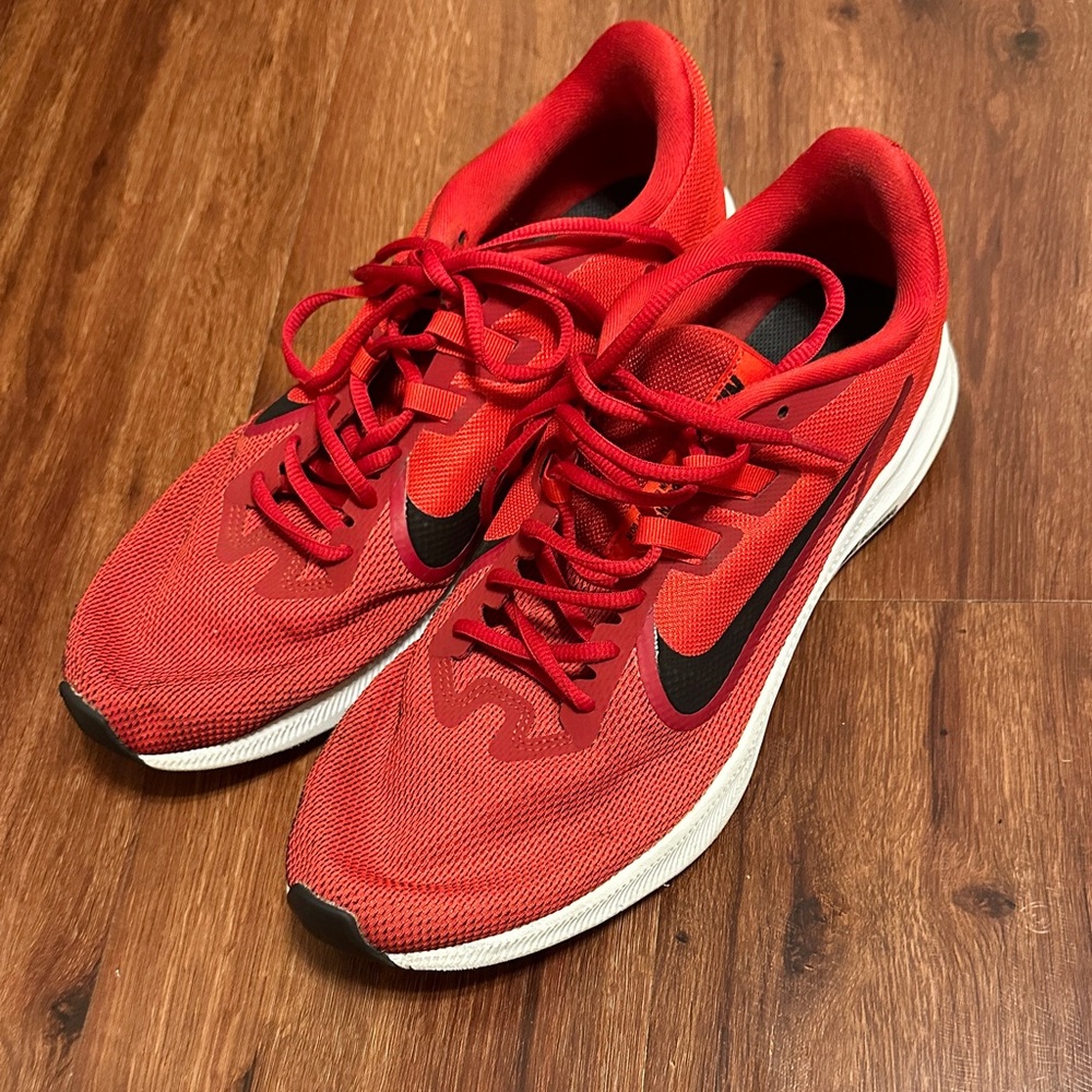 Nike Men's Red Running Sneakers with Black Swoosh